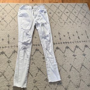 000 White aero ripped skinny jeans